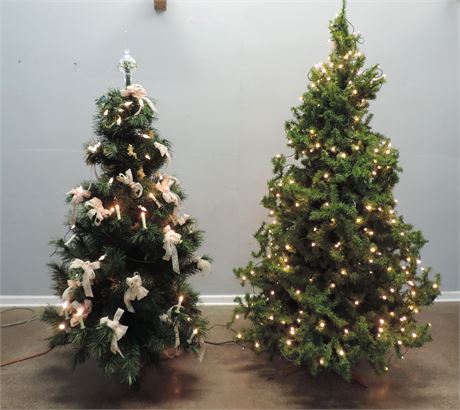 Two Artificial Lighted Christmas Trees