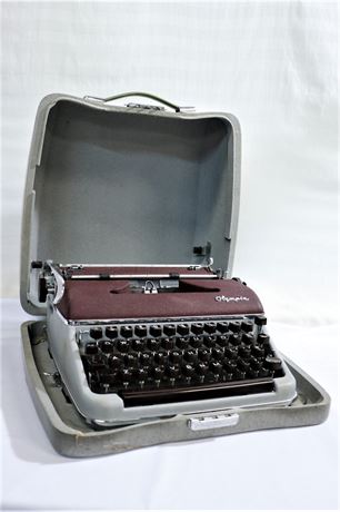 Vintage Portable Olympia Typewriter Delux