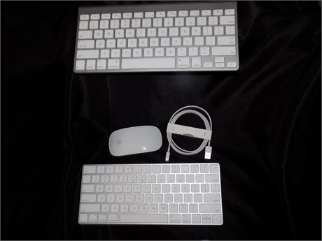 Two Apple Magic Keyboards