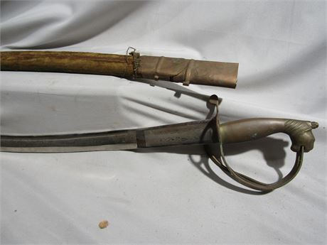 Indian Cutlass With A Brass Mount and Etched Blade