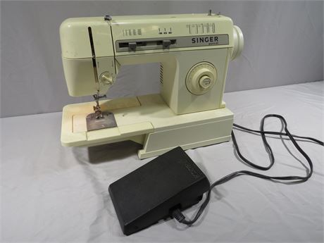 Sold at Auction: vtg singer baby serger sewing machine