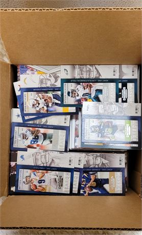 MISCELLANEOUS ASSORTMENT OF FOOTBALL CARDS IN AN 8X8X8 BOX