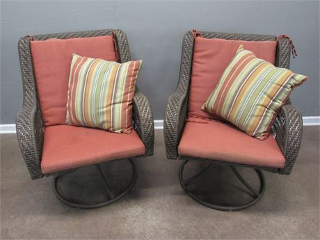 2 Synthetic Wicker Swivel Rockers with Cushions and Throw Pillows