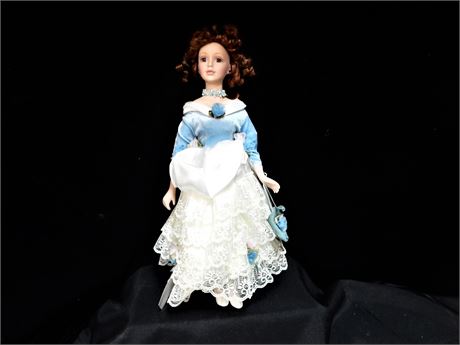 Elegant Porcelain Collector Doll