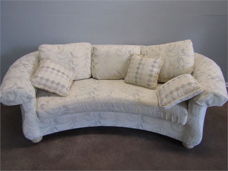 Norwalk Curved Sofa with Wood Frame, Cream Color Pillows