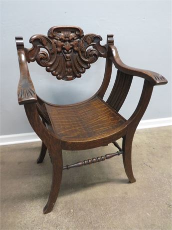 STOMPS-BURKHARDT Carved Oak Face Saddle Chair