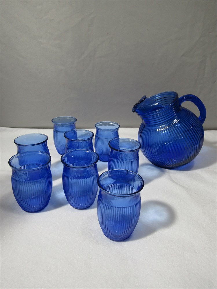 Sold at Auction: Glass Juice Pitcher With 5 Glasses