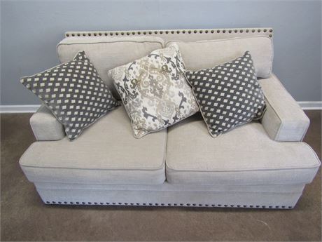 Gray Loveseat with Squared Arms, and 3 Accent Pillows and Nailhead Trim