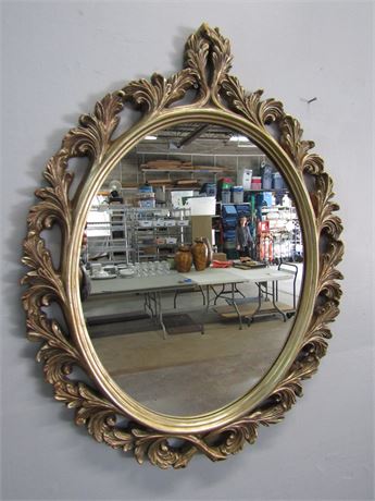 Oval Shaped Mirror with Wide Gold Wrap Around Leaf Trim