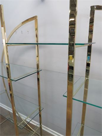 Lot - A Milo Baughman brass and glass shelf etagere