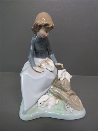 NAO by Lladro "Girl With Bunnies" Figurine
