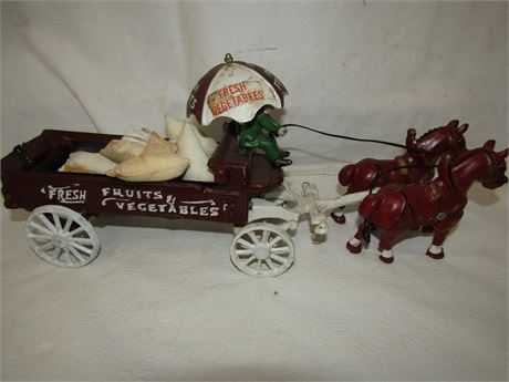 Cast Iron Horse and Vegetable Cart.