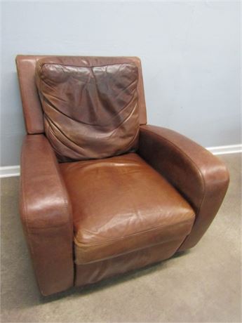 Brown Leather Arm Chair with Reclining Foot Rest