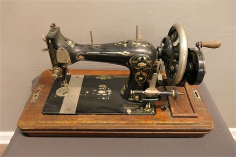 Vintage Sewing Machine in a Wood Carrying Case