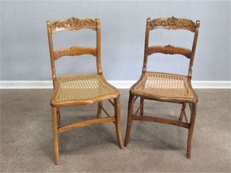2 Antique Cane Seat Chairs with Carved Backs
