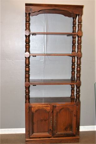 Vintage Shelving Unit via the 70's with a cabinet tucked in the bottom