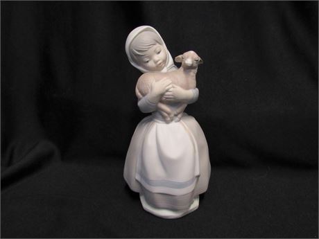 Nao by Lladro - Girl Holding a Lamb Figurine