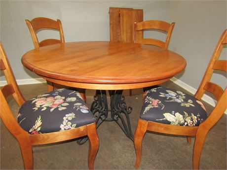 Round Solid Wood Dining Table with Decorative Metal Base, Nichols & Stone Chairs