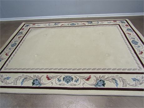 Large Cream Colored Area Rug with Simple Floral Design