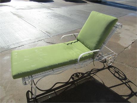 Metal Patio Lounge Chair with Lime Colored Cushion and Wheels