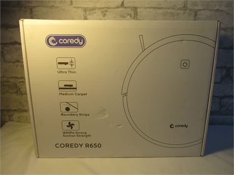 New Coredy, Model R650 Automatic Vacuum Robot  in box