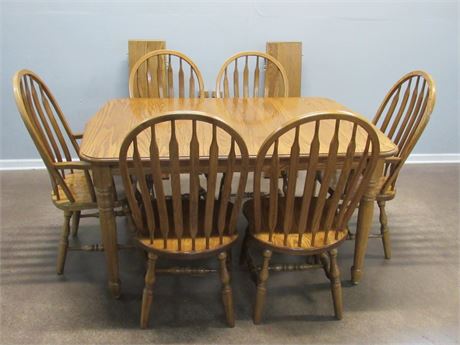 Oak Dining Table with 4 Leaves and 6 Arrow-back Chairs