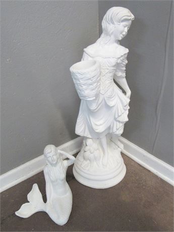 2 Statues - Large Plaster Girl with Basket and a smaller Cast Metal/Iron Mermaid