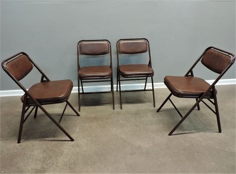 Four Samsonite Soft Faux Leather Folding Chairs