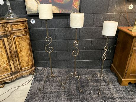 Three Floor Candleholders with Candles