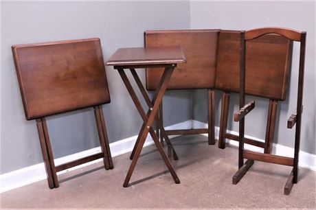 Four Wood Folding Tables (TV Trays) and stand to hold them all.