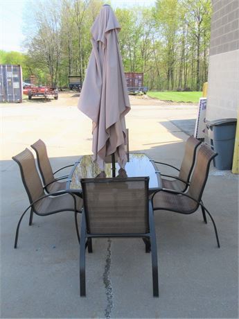 Patio Table with 6 Chairs and an Umbrella