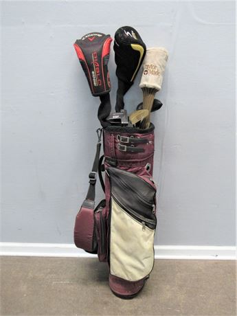 8 Golf Club Lot - 3 Metal Woods and an Array of Putters plus a Bag