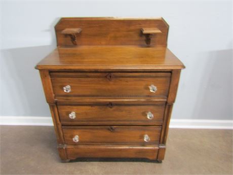 Antique Solid Wood Dresser with Backsplash and Clear Handles, 1881-1899