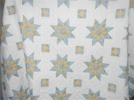 Vintage Hand Crafted Quilt with Classic Star Pattern in Soft Pastel Colors