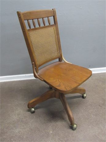 Vintage Oak Cane-Back Adjustable Office Chair