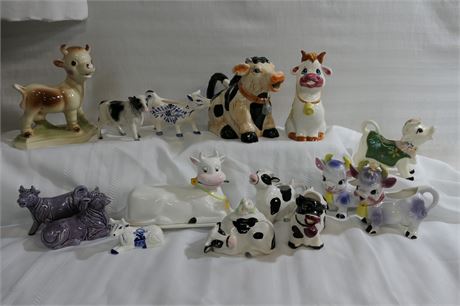 Mixed lot of ceramic cows as creamers, salt/pepper shaker, butter dish, figurine