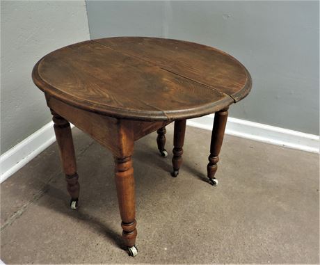 Antique Round Side Table with Casters