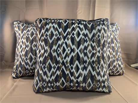 Three Zippered Patterned Pillows
