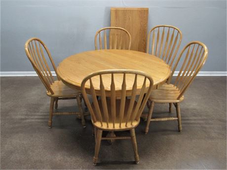 Oak Pedestal Dining Table with 5 Chairs and 1 Leaf