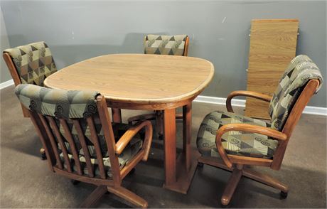 Five Piece Double Pedestal Dinette set with Rolling Chairs