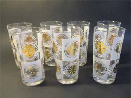 7 Piece Gold and White Tone Mid-Century Glass Collection